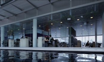 A building management system can be a key tool for any business. It can provide a comfortable working environment for building occupants — enhancing productivity and contribute significantly to saving energy costs and a reduced carbon footprint if used correctly. All too often the capabilities of the BMS itself are not fully utilised, and the potential benefits are lost. To fully realise this potential the system should be used as the true building manager linking together as many of the different systems that use energy within the building as possible. Users have been put off doing this in the past because of concerns about the potential complexity of the system and the possible increase in initial costs for the system. These issues are now easier to overcome, and an integrated building management system such as the Desigo BMS from Siemens will bring many benefits to the building owner or user. The key to achieving these benefits is the interaction between devices. A practical example is the control of a meeting room. When the room is unoccupied it is appropriate to reduce the heating temperature setpoints, increase those for the cooling and turn the lighting off. This can all be done via a signal from an occupancy or CO2 sensor to both the lighting- and temperature-control systems. In most cases however this does not happen; the two systems are not integrated, and energy-saving potential is lost. This is a shame as this type of demand-based control is relatively easy to implement, and the payback period for any additional work can be fairly short. The EN 15232 European standard for energy efficiency in buildings states that savings of 30% can be achieved using this type of control. The ventilation system can also be controlled based on the same demand information. Again this can be linked into the overall system so fans controlled by variable-speed drives can be turned down to save energy and help prolong the life of the plant equipment. The fact that this can all be done automatically increases the energy-saving potential because the system is not relying on users to remember to turn systems down or off. Other benefits are available. The BMS head end can be used as a single point of information for the whole building if all the building-services data are linked to it. This means information from multiple systems can be displayed on a single page to help give a clearer picture of how the building is performing. Data from meters can also be integrated into the BMS allowing it to become both the monitoring and control system. This makes analysis of different parts of the building or even multiple buildings more straightforward. Energy usage from the different sub-systems in the building such as the lighting and heating systems can be displayed together. One of the main advantages of having a single system is that training effort is reduced as operatives only need to learn one way of how to interface all their building services information. The last few years has seen a huge growth in the number of building-services products using open communication protocols such as BACnet, LON, KNX, Modbus, M-Bus and others — including chillers, pumps and variable-speed drives, as well as some fire and security systems. This has made integration more straightforward and helped reduce the cost and complexity of such projects. It also allows for more ‘low-level’ integrations at a local level to help reduce complexity in the system. The key to a successful integrated system is to ensure proper planning takes place. End users must be clear what they want to achieve from their systems and this needs to be understood by everyone involved in a project. Make sure each piece of information that is integrated is necessary and gives a clear benefit in either operational or energy-saving terms. Integrating unnecessary information adds to the engineering time and costs and introduces unnecessary complexity to the system. The final factor that needs to be taken into account is the cost analysis of an integrated system. On average, 20% of total life-cycle costs arise during planning and construction of a building, with the remaining 80% during its usage — assuming an average building lifecycle of 50 years. The payback of such an integrated system is quite short, so its energy-saving benefits will be enjoyed for a long time and continue to benefit the user. Ian Ellis is marketing manager with Siemens Building Technologies. www.siemens.com